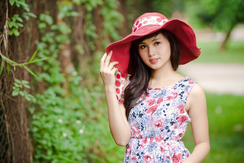 woman in red hat outdoors