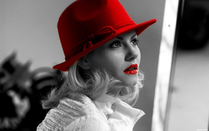 woman in red hat portrait