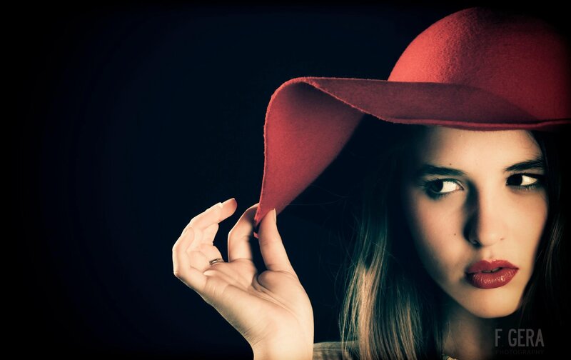 woman in red hat portrait