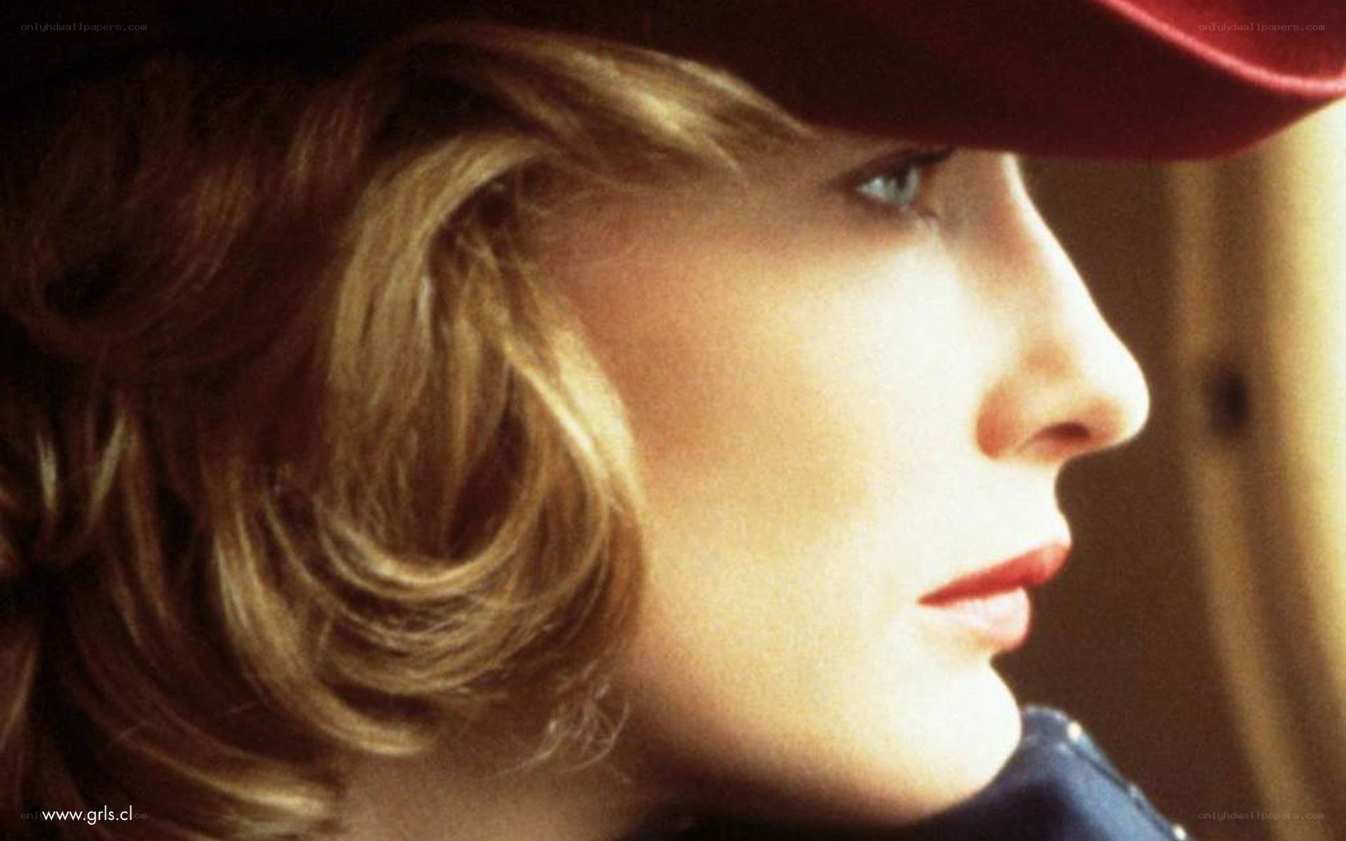 woman in red hat profile