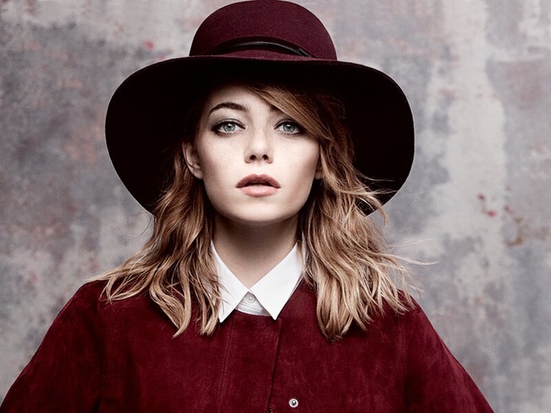 Woman in Red Hat — Serious