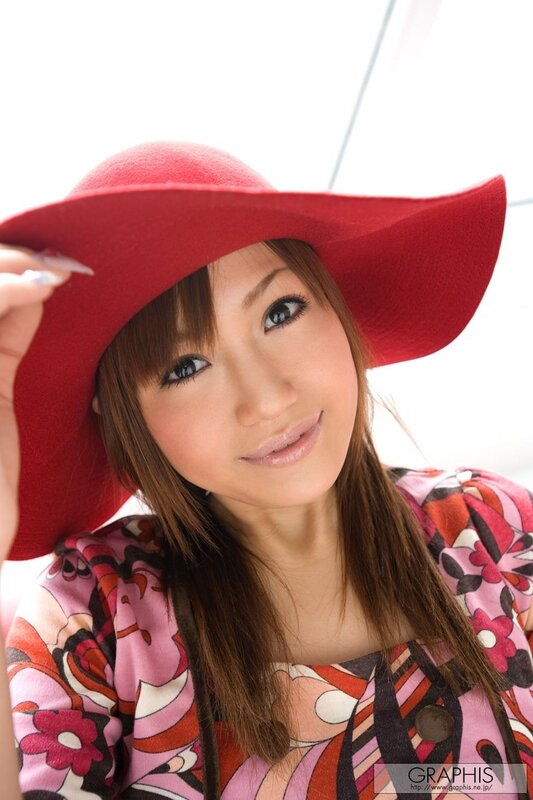 woman in red hat smiling