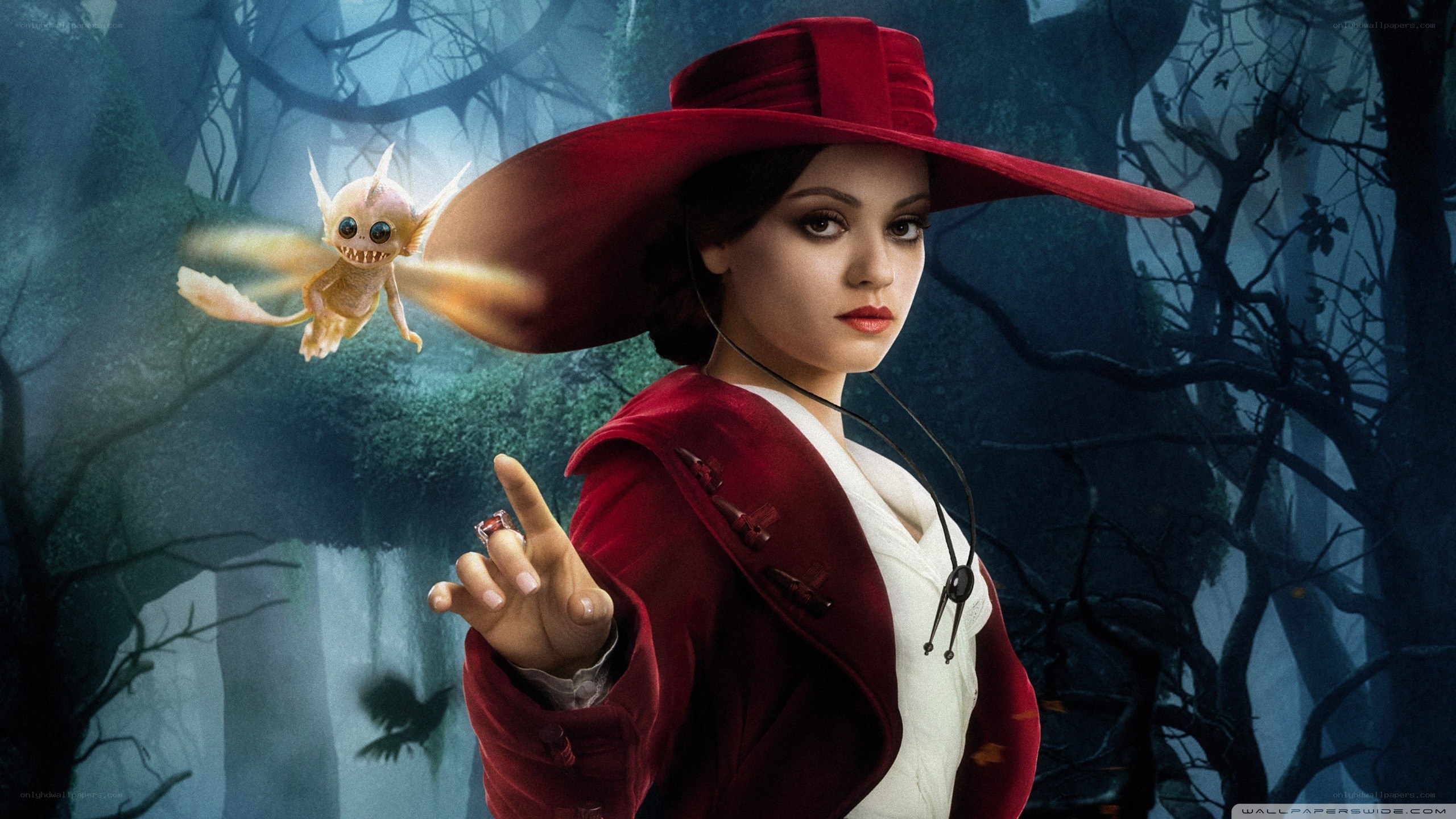 woman in red hat with creature