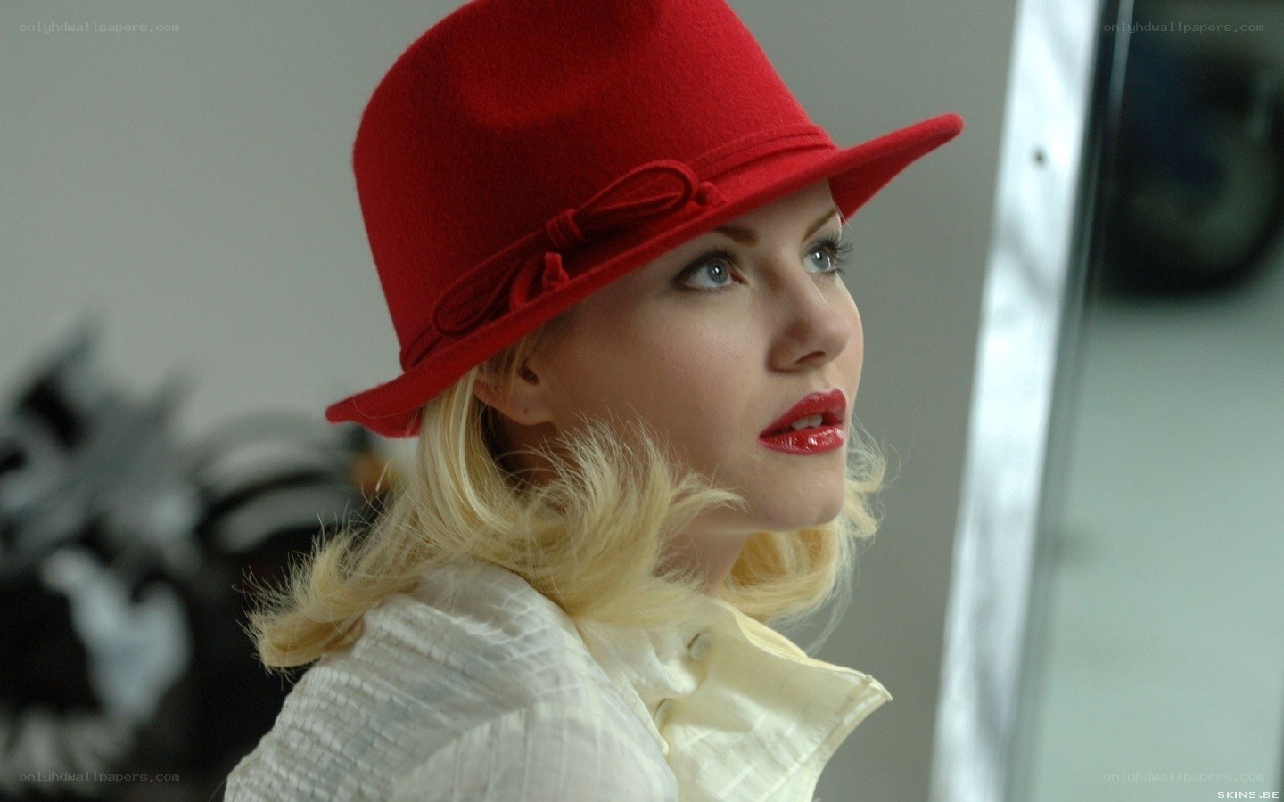 woman in red hat