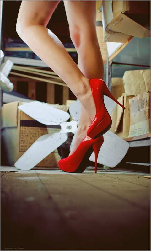 Woman in Red Heels — Dramatic, Photograph, Cardboard Boxes