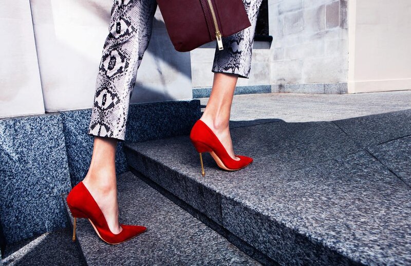woman in red heels on steps