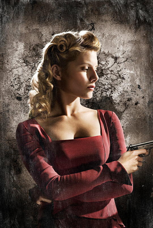Woman in red holding a gun