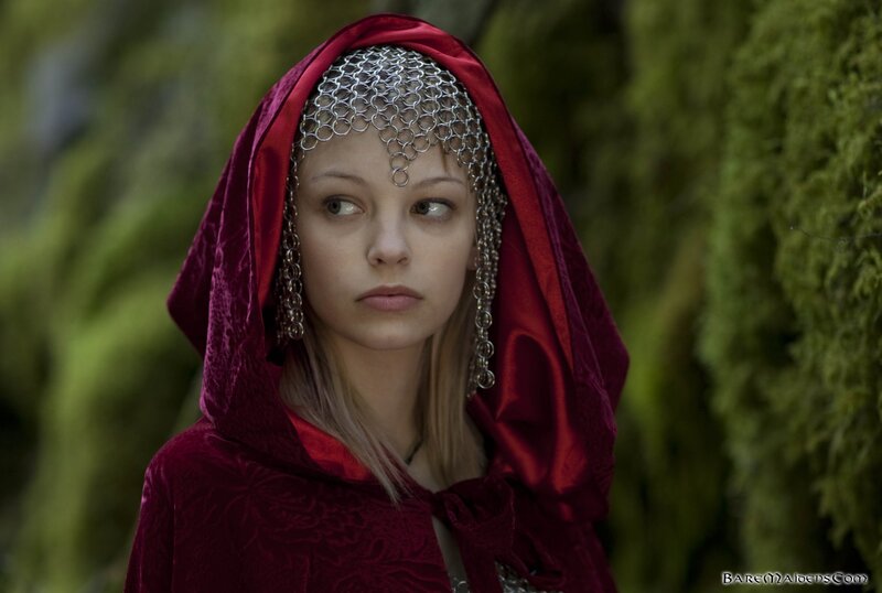 woman in red hood and chainmail