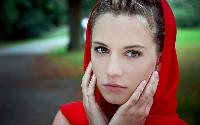 Woman in Red Hood — Contemplative