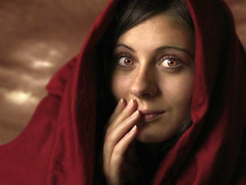 Woman in Red Hood — Dramatic, Photograph, Hand