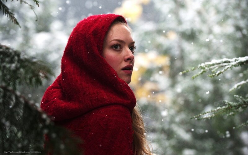 woman in red hood in snow