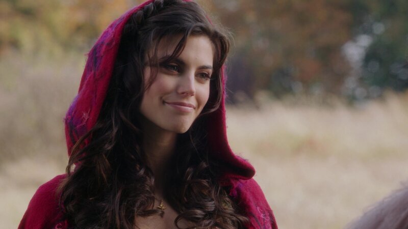 woman in red hooded cloak
