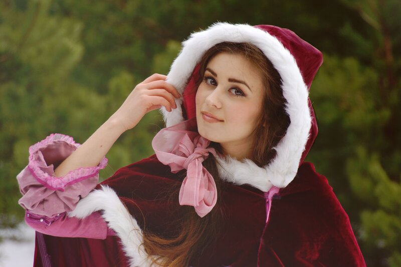 woman in red hooded cloak