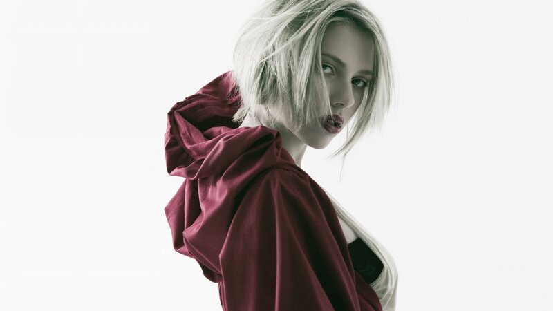 woman in red hooded cloak