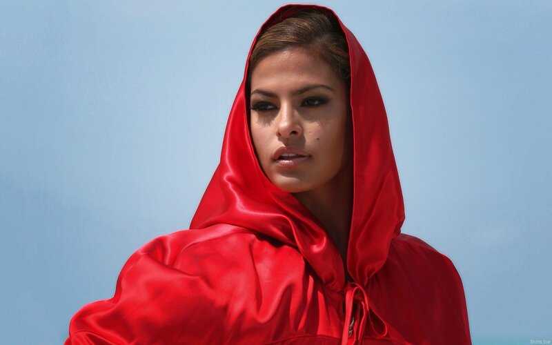 woman in red hooded cloak