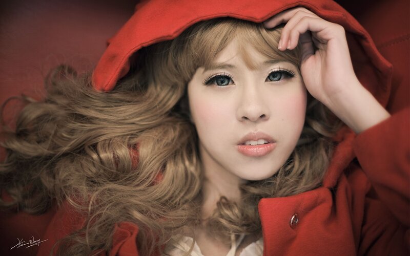 woman in red hooded coat