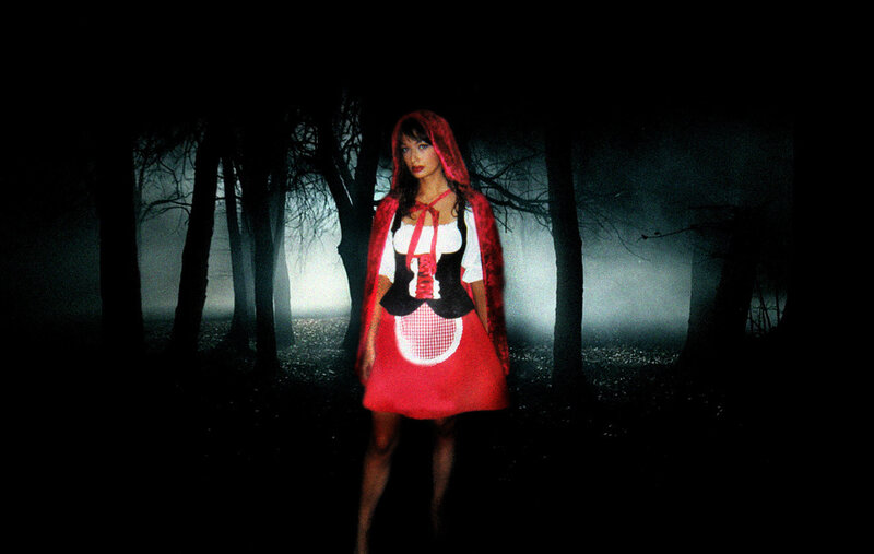 woman in red hooded costume
