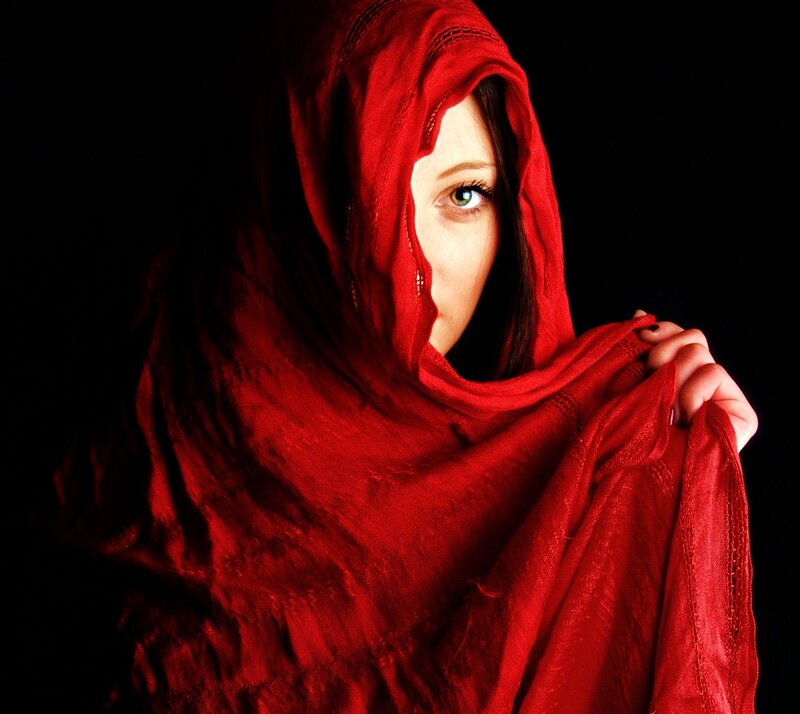 woman in red hooded garment