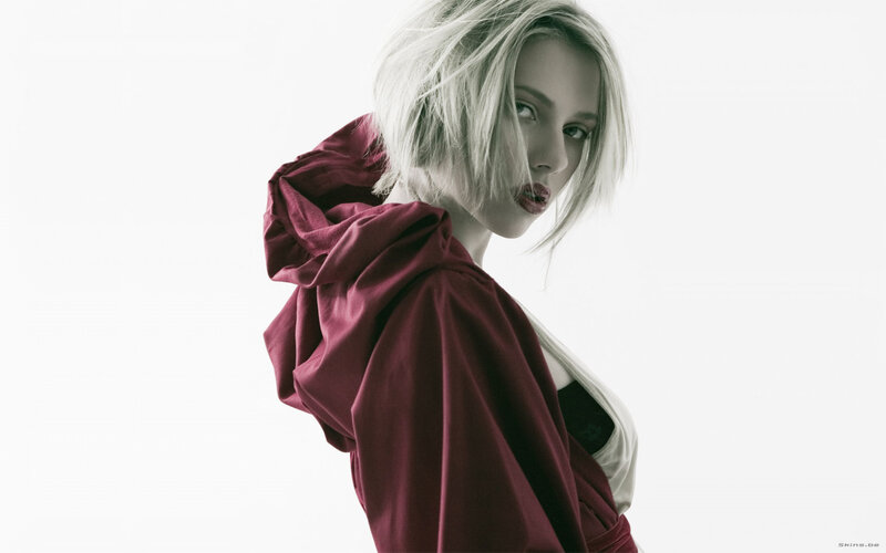 woman in red hooded garment