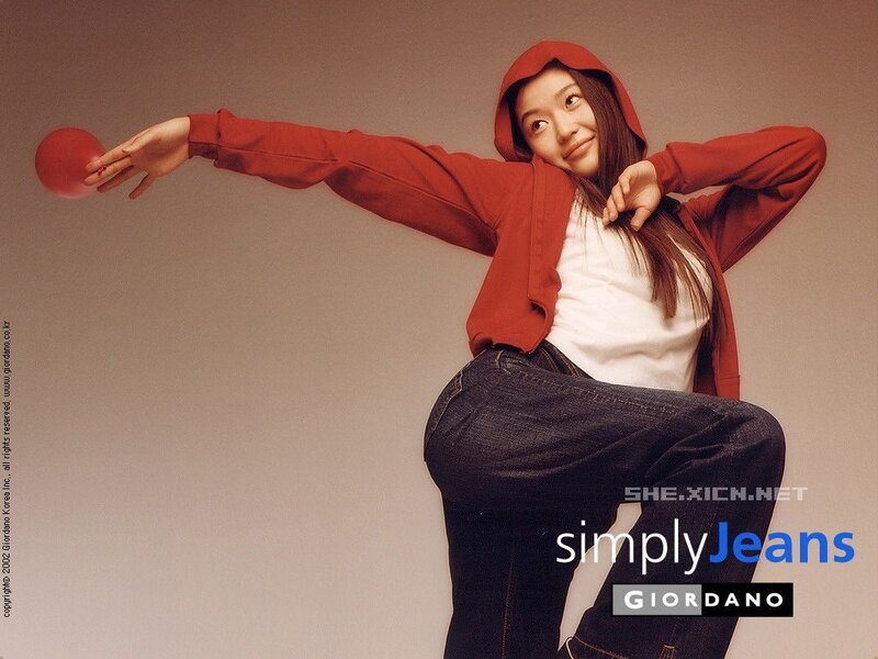 woman in red hoodie holding ball