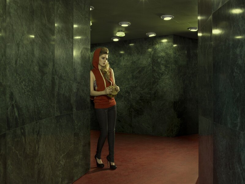 woman in red hoodie standing