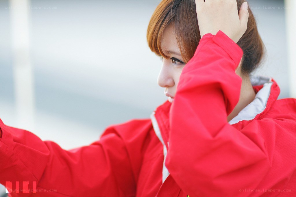 woman in red jacket