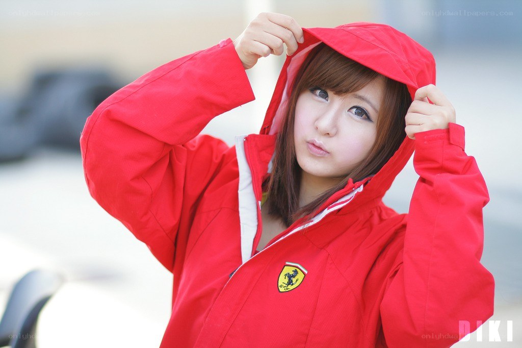 woman in red jacket