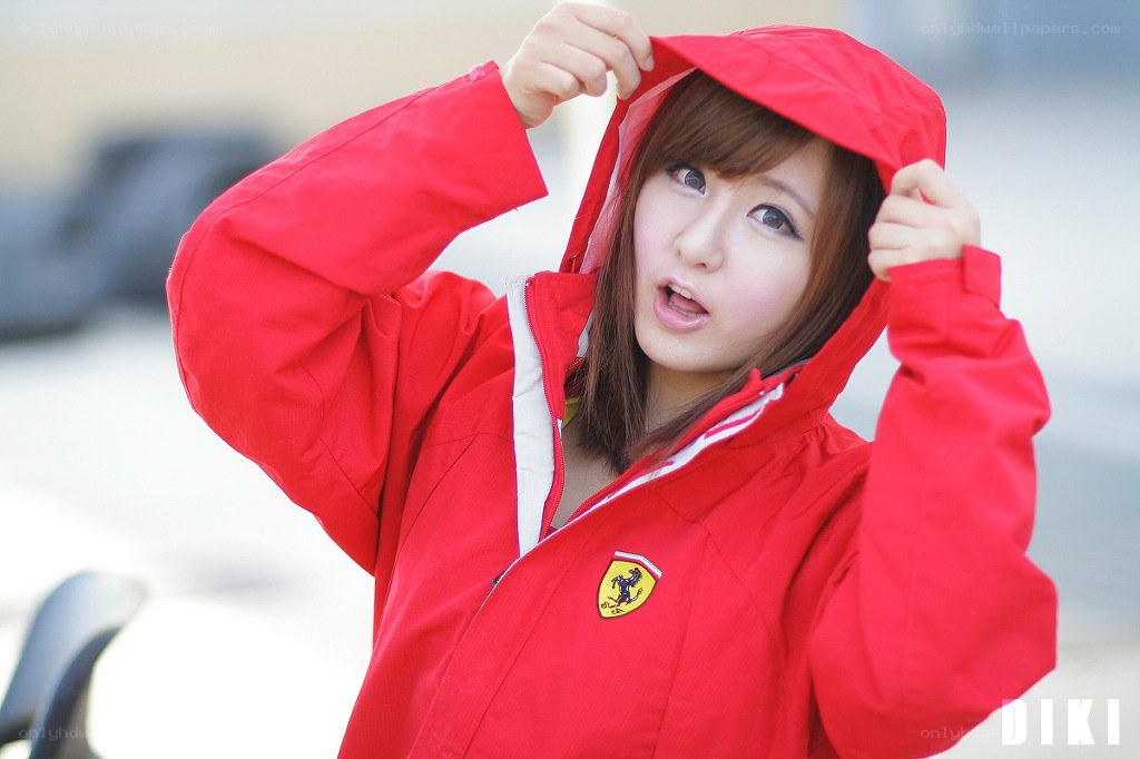 woman in red jacket