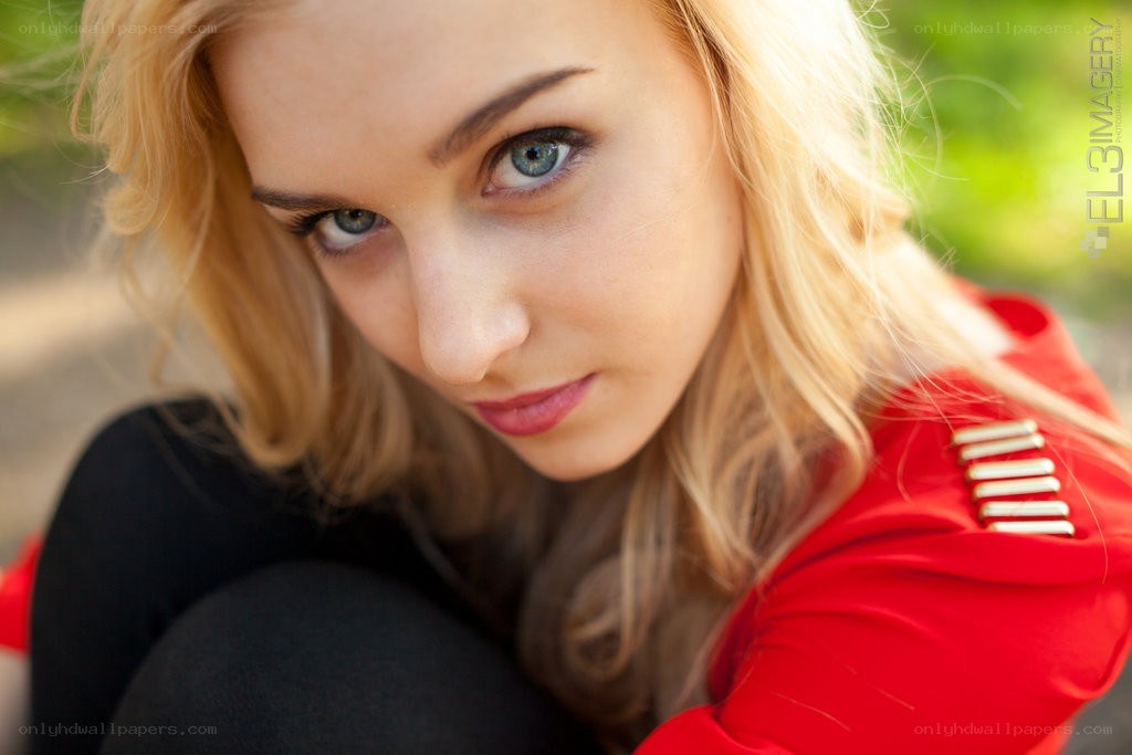 woman in red jacket