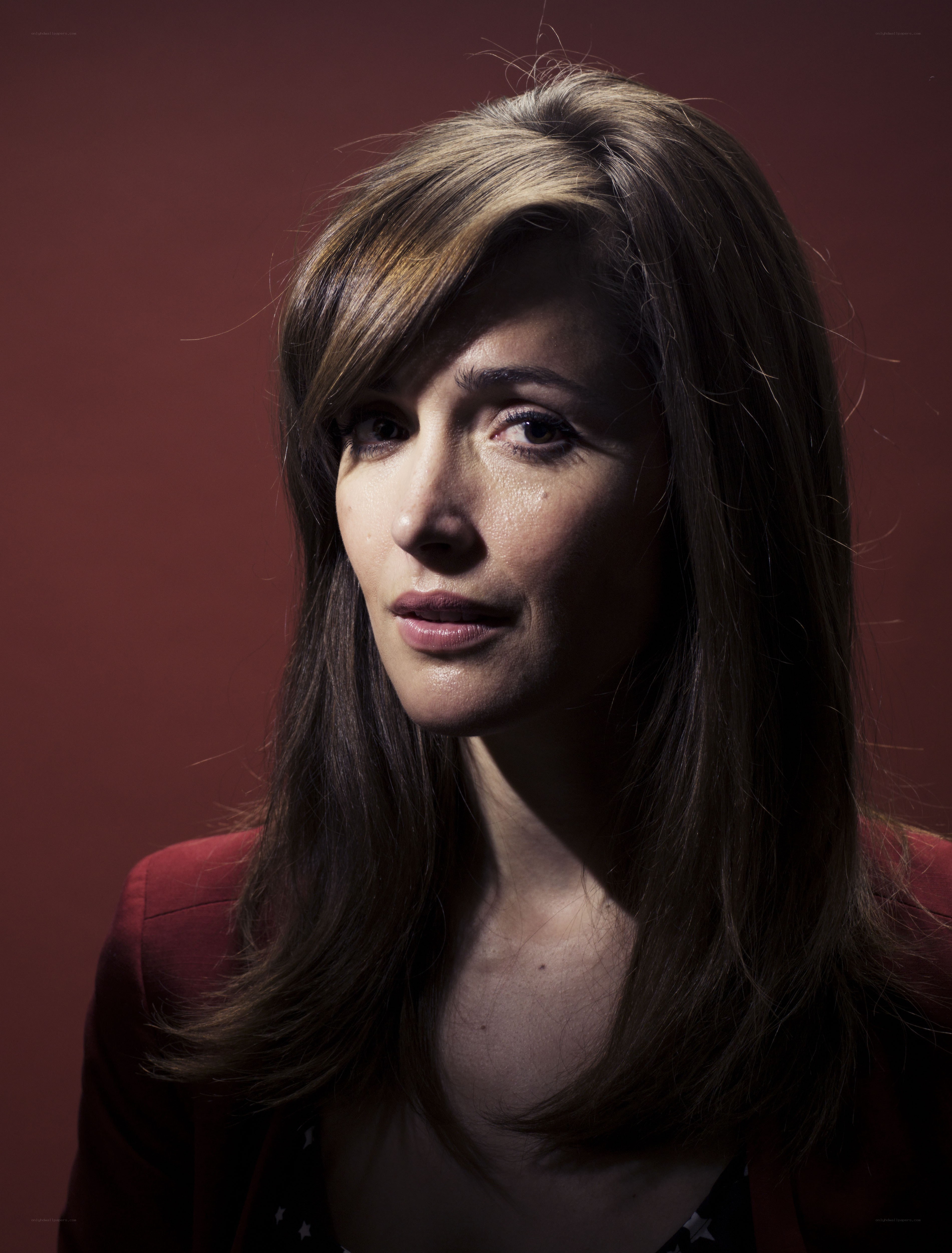 woman in red jacket