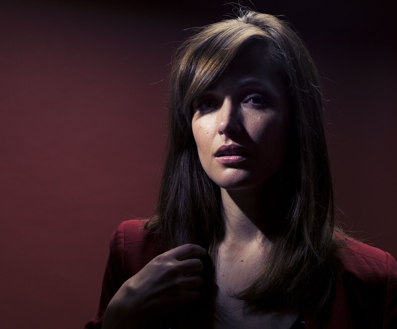 woman in red jacket