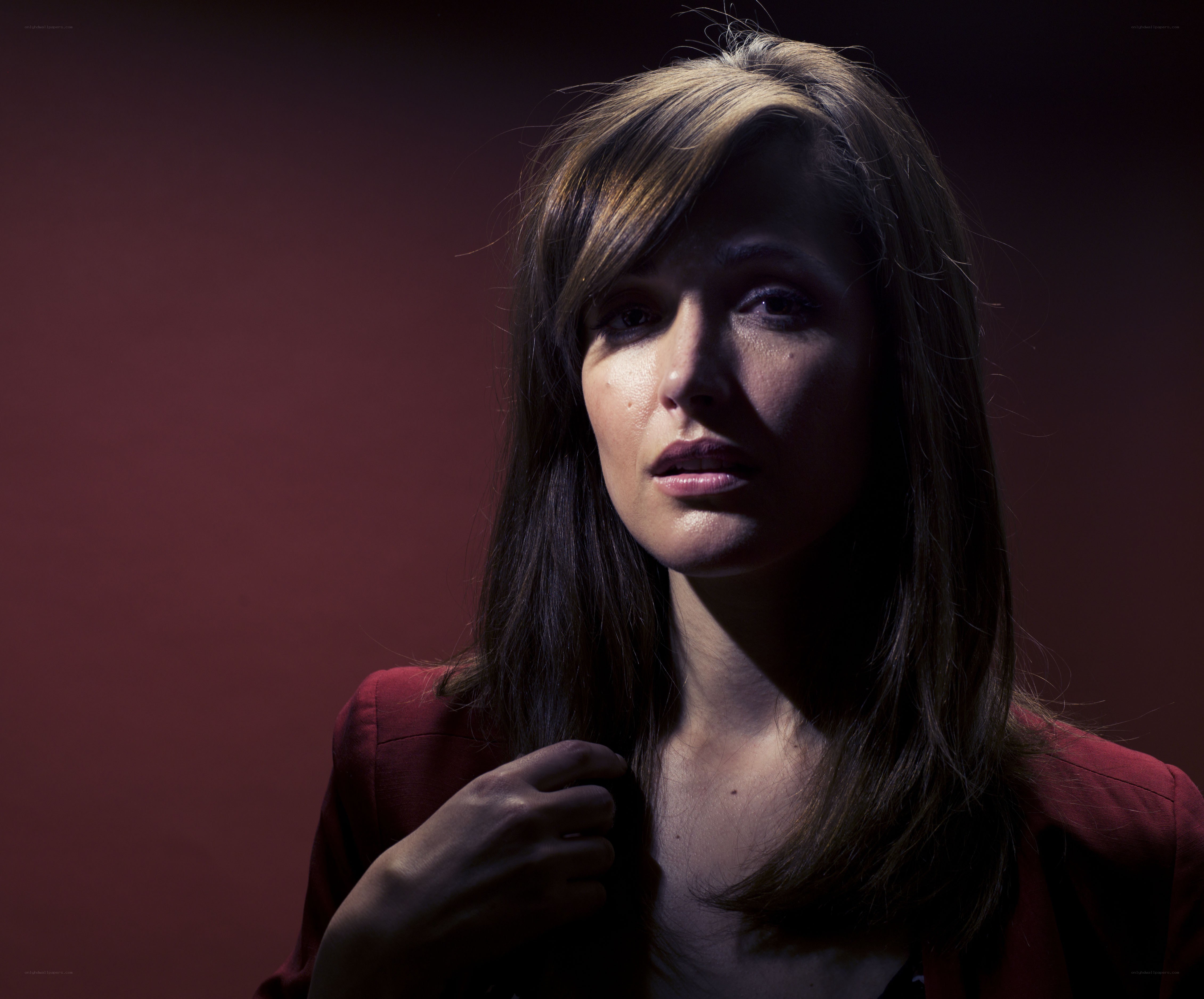 woman in red jacket