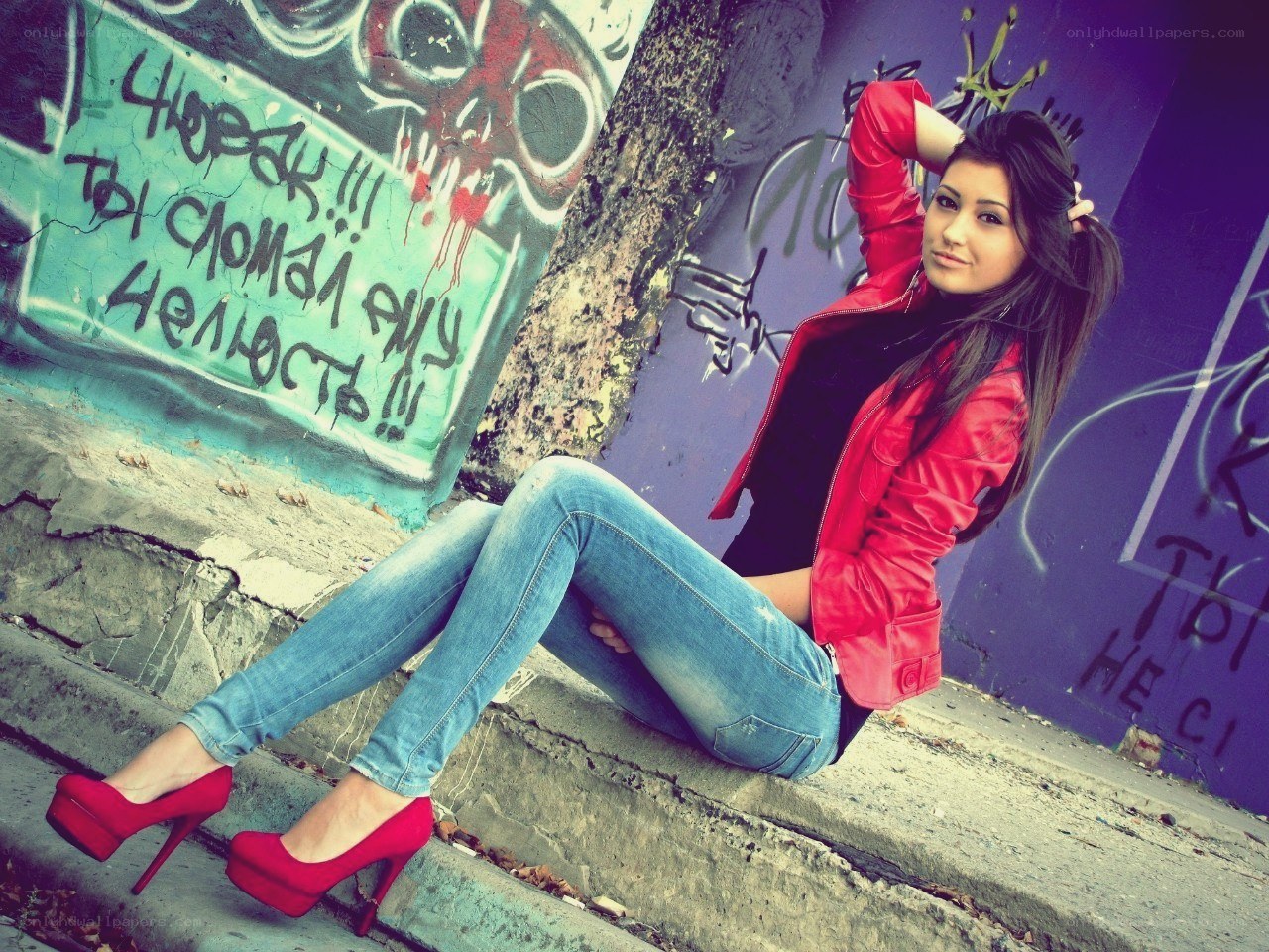 woman in red jacket on steps
