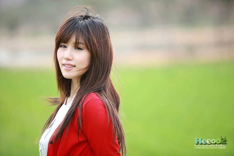 woman in red jacket outdoors