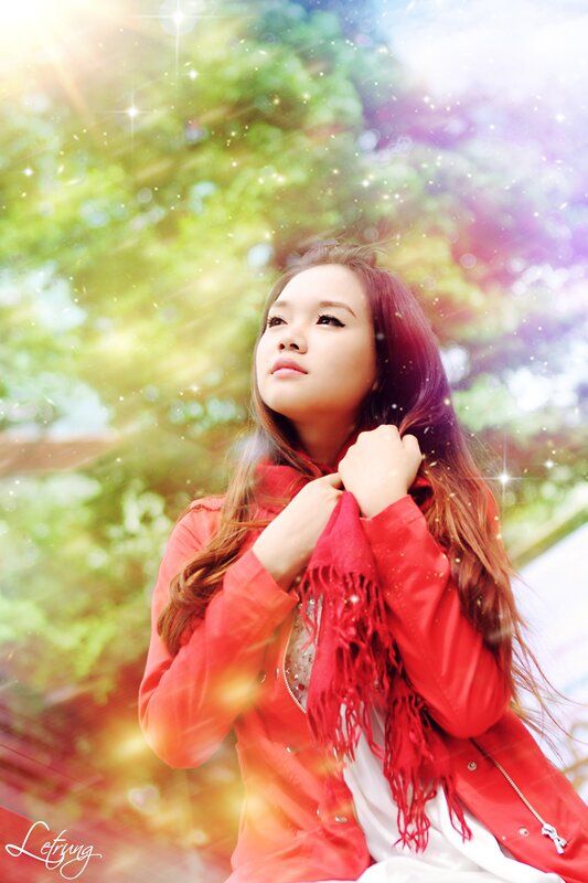 woman in red jacket with sparkles