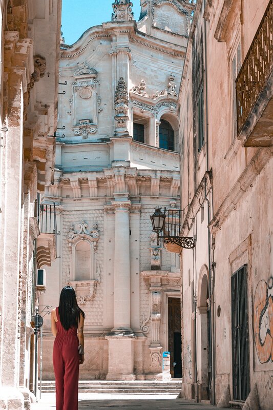 Woman in Red Jumpsuit — Serene