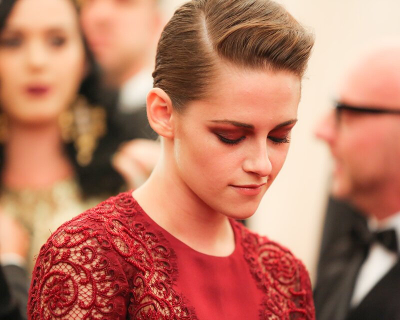 woman in red lace dress