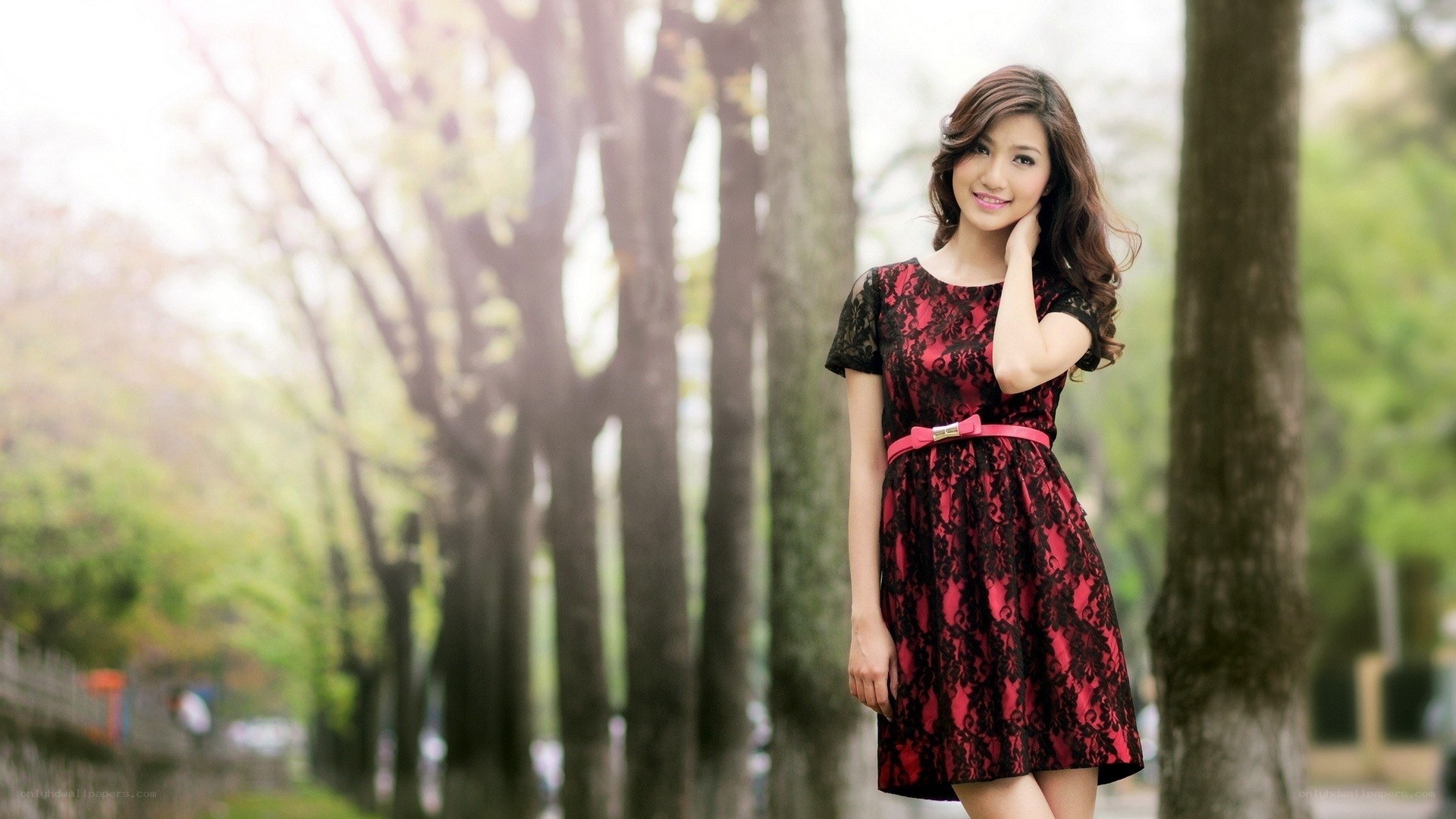 Woman in red lace dress