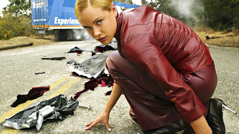 Woman in red leather after crash