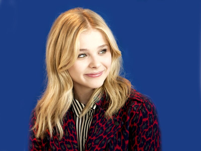 woman in red leopard coat