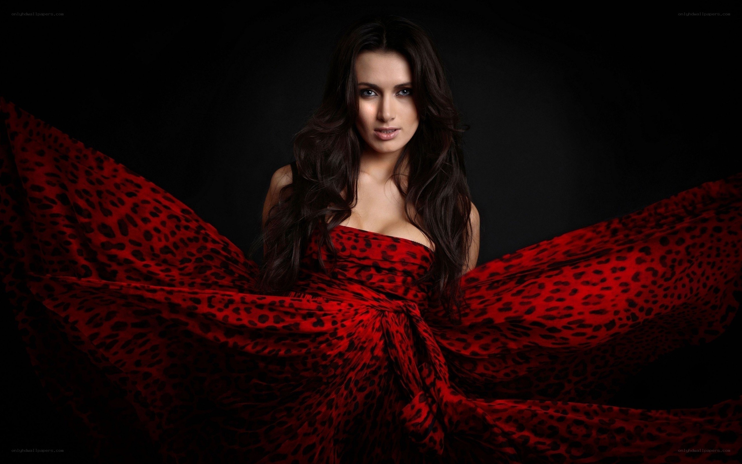 woman in red leopard dress