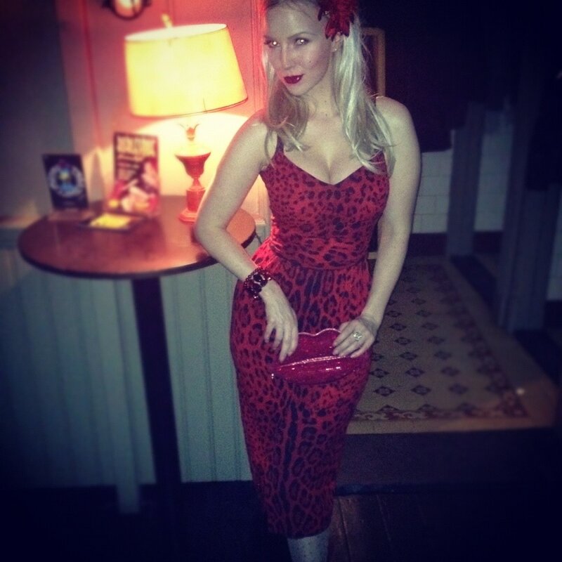 Woman in red leopard dress