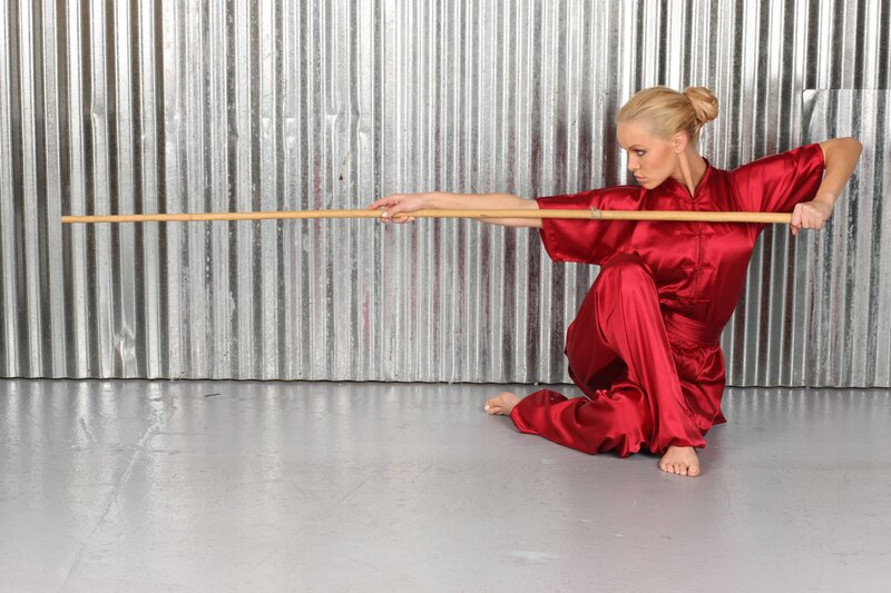 Woman in Red Martial Arts Uniform — Focused, Photograph