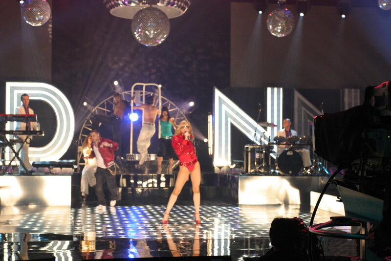 Woman in Red Outfit — Energetic