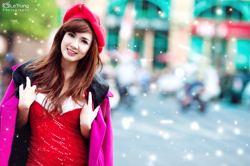 woman in red outfit smiling