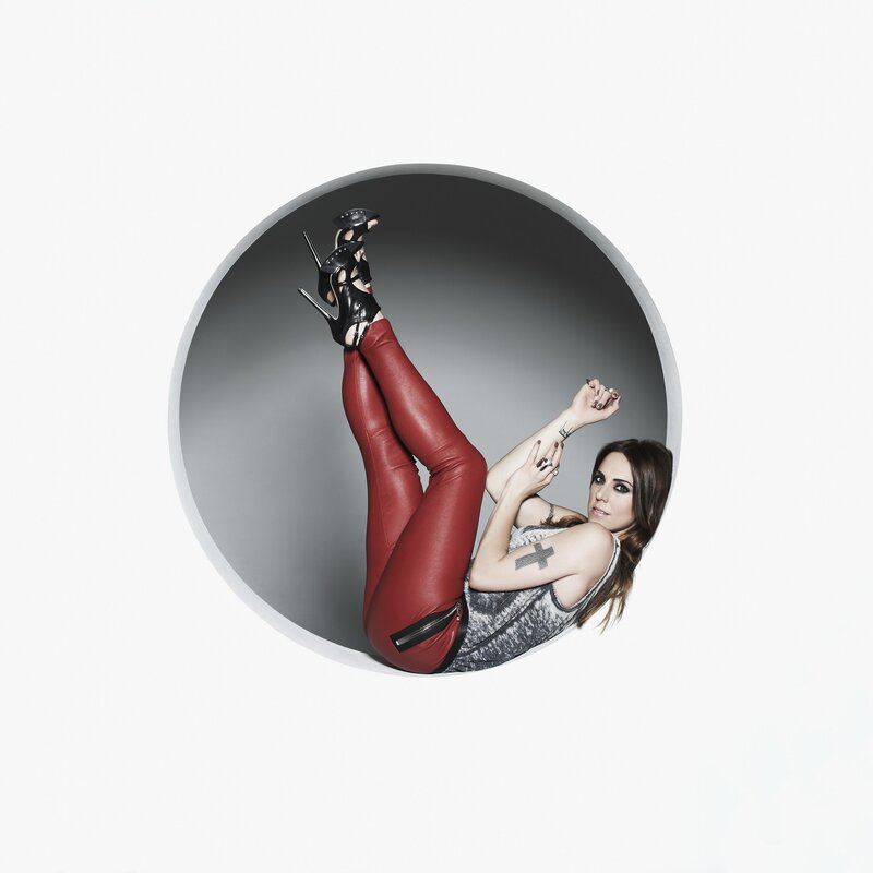 woman in red pants and high heels