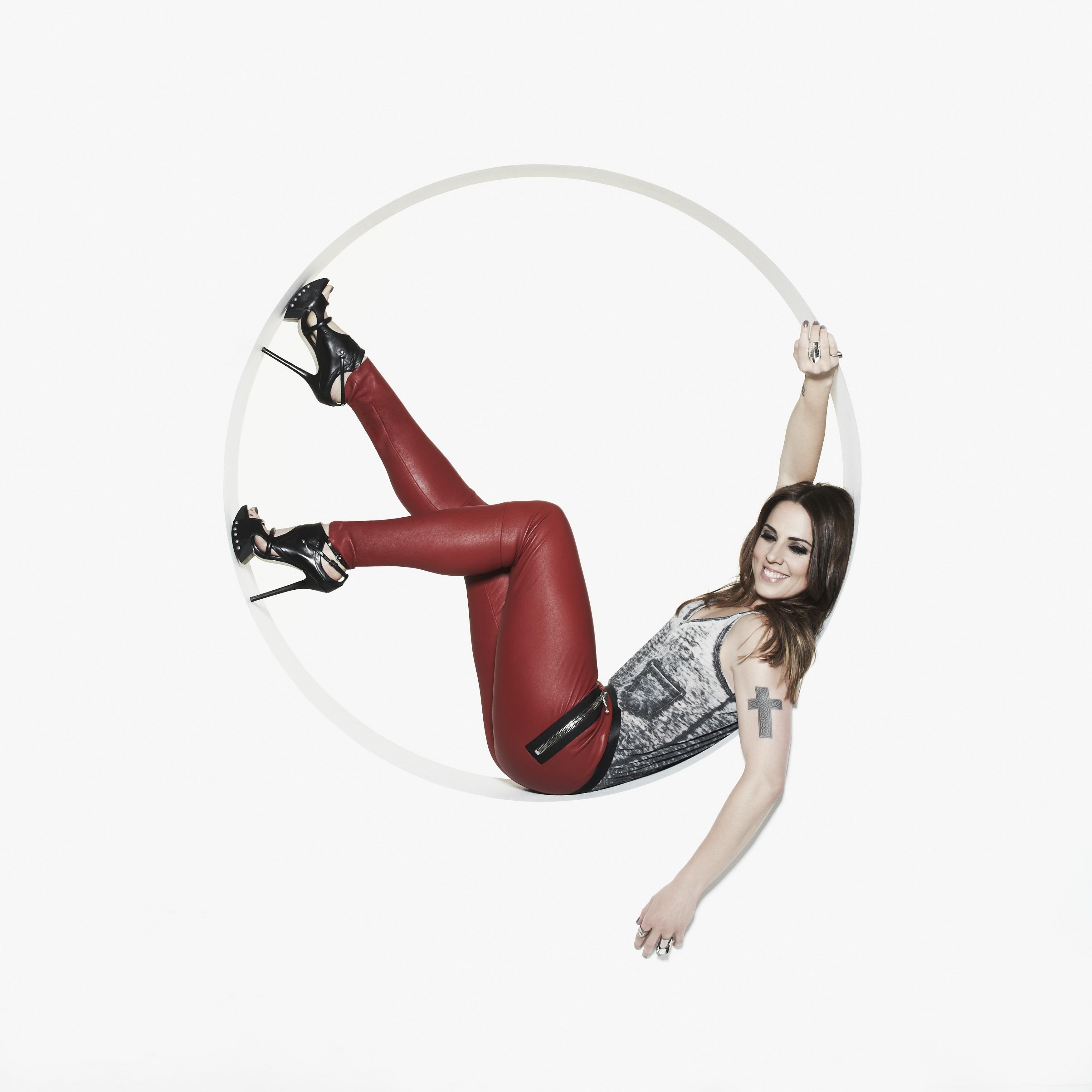 woman in red pants posing