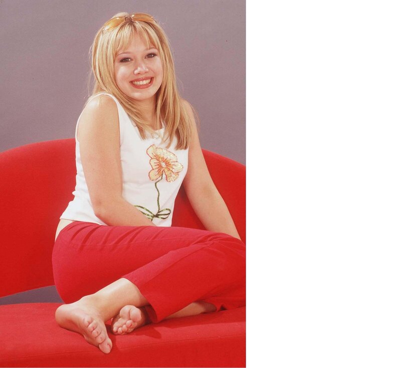 woman in red pants smiling