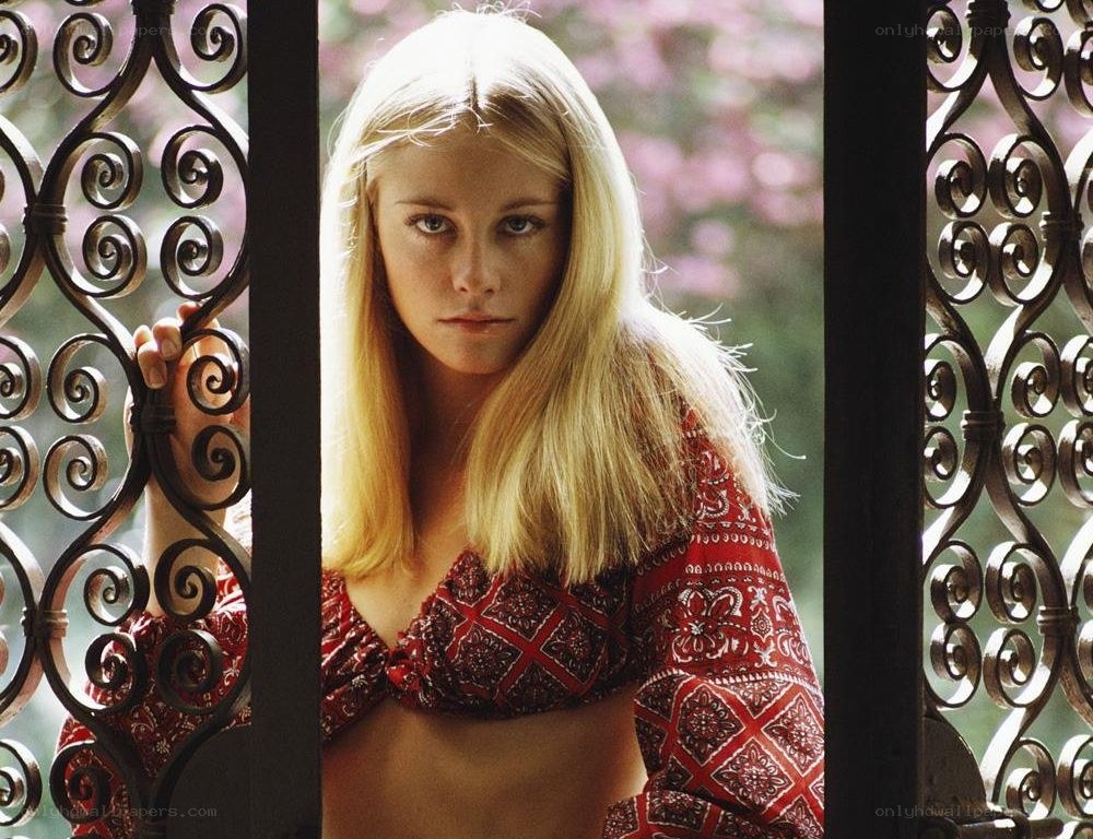 woman in red patterned top