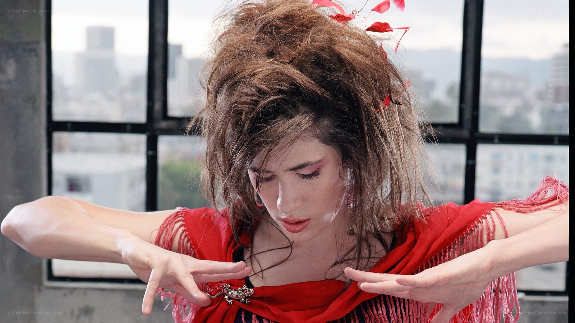 woman in red performing dance